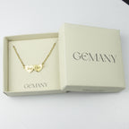 Colar_Meus_Coracoes_dourado_personalizado_apresentado_na_caixa_da_marca_ideal_para_presentear_alguem_especial